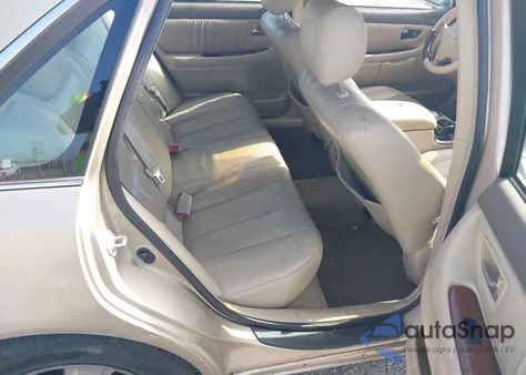 2003 Toyota Avalon Xls z USA, uszkodzony, nr VIN 4T1BF28B33U323234